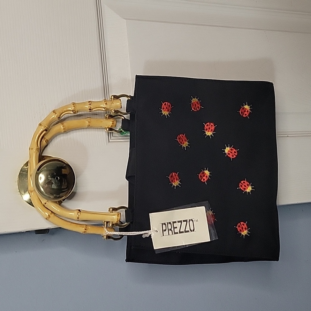 Embroidered ladybug purse
